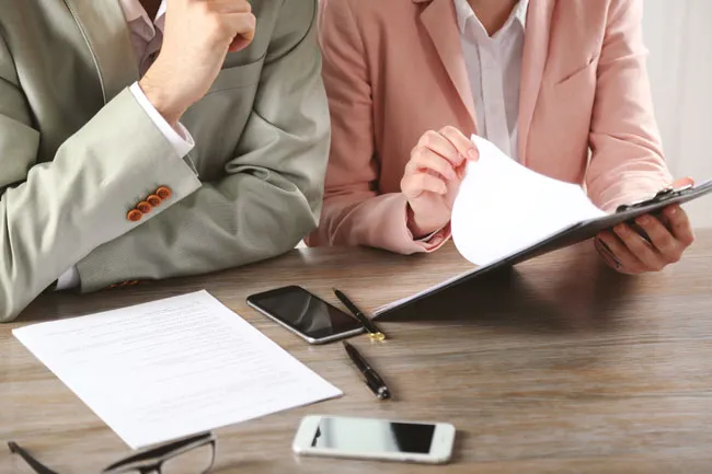 Divorcing couple in Edmonton Alberta, negotiating property division with help of Family Law lawyer Belal Najmeddine, who has a law office in Edmonton.