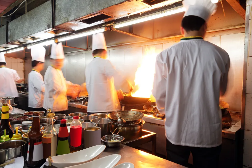 photo of workers in an asian food restaurant