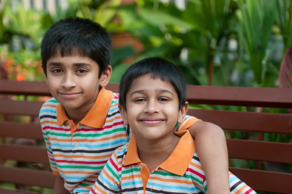 photo of two young boys recently immigrated to Canada