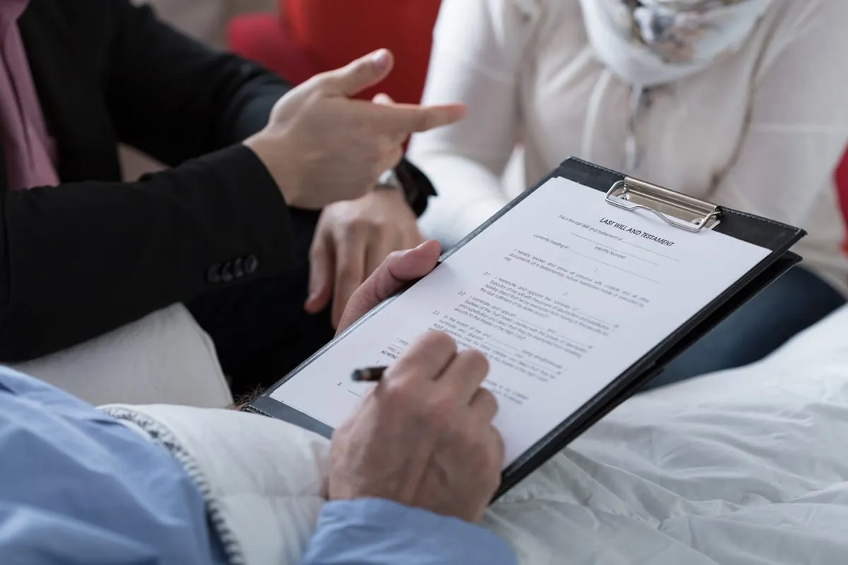 photo of a family reviewing the will of a loved one after they have passed