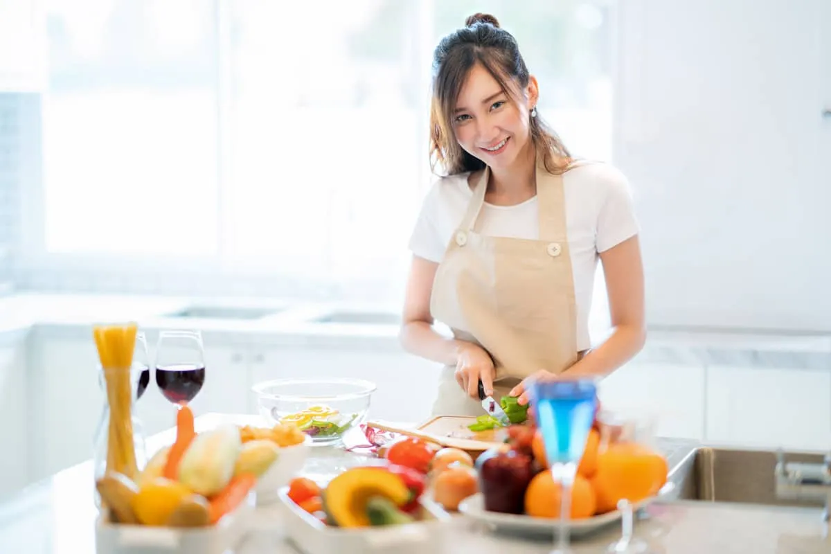 photo of an Asian female, a spouse who was recently sponsored by her partner to immigrate to Canada