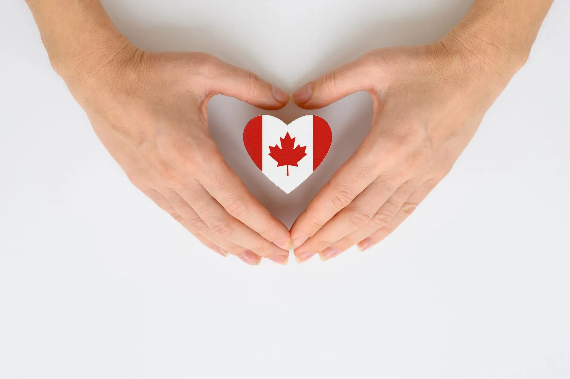 man covering maple leaf